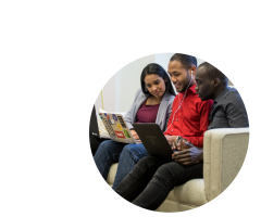 three-friends-working-on-couch